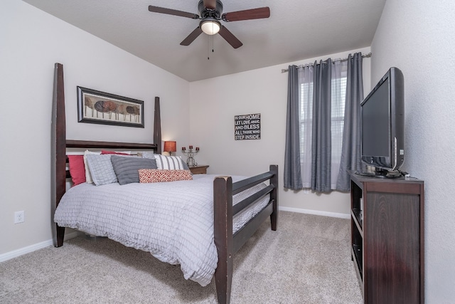 bedroom with light colored carpet and ceiling fan