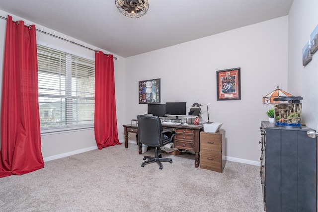 office area with light colored carpet