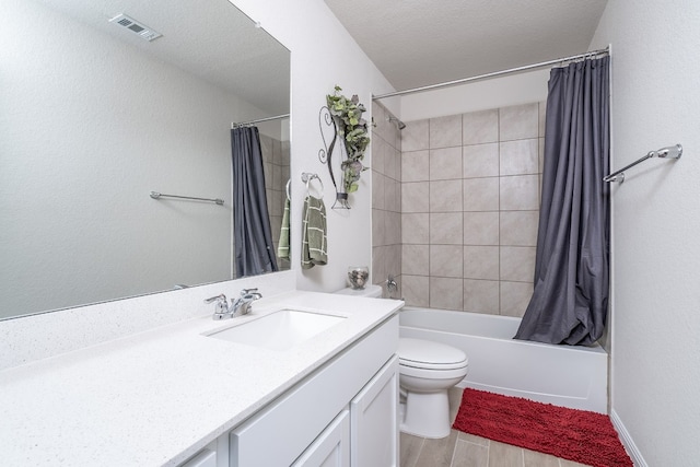 full bathroom featuring wood-type flooring, shower / bath combination with curtain, vanity, toilet, and a textured ceiling