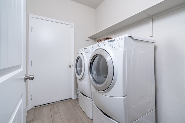 laundry room with washer and dryer