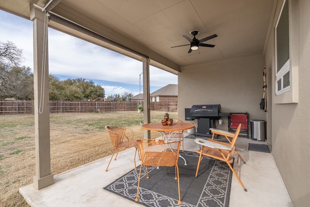 view of patio featuring grilling area and ceiling fan