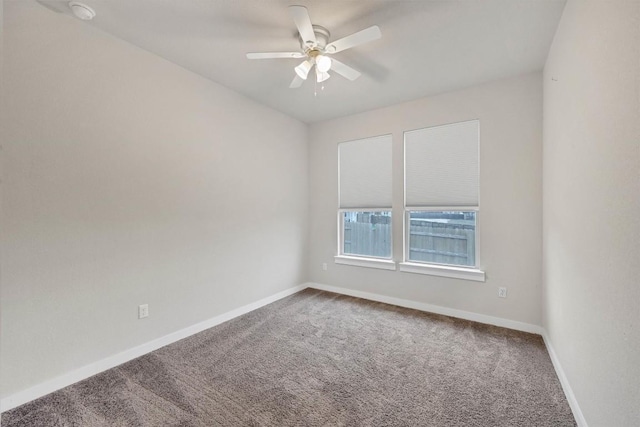 unfurnished room with carpet flooring and ceiling fan