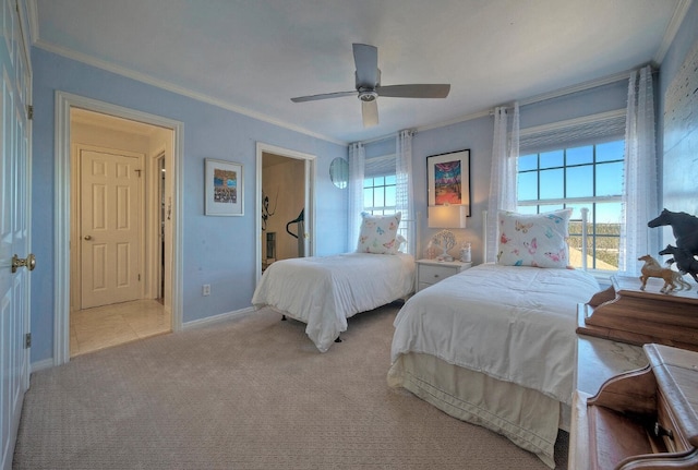 carpeted bedroom featuring multiple windows, crown molding, and ceiling fan