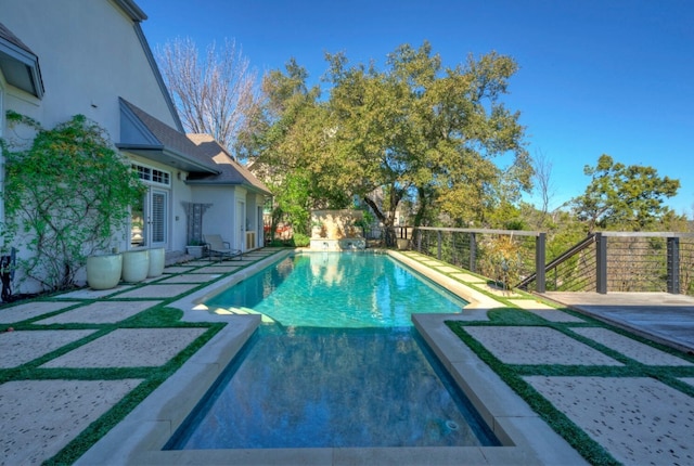 view of pool with a patio area