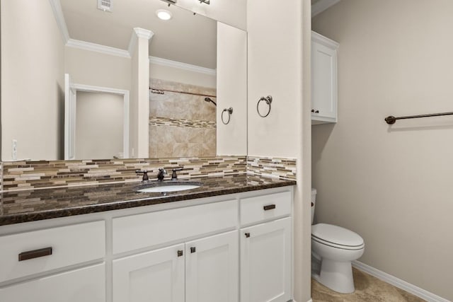 bathroom with decorative backsplash, ornamental molding, vanity, walk in shower, and toilet