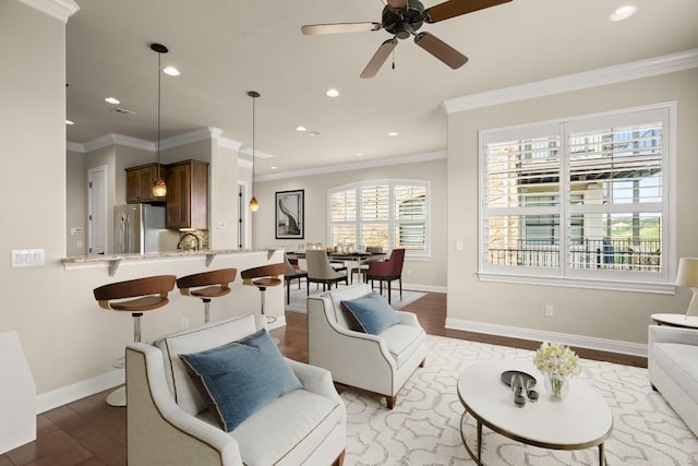 living room featuring crown molding, ceiling fan, and dark hardwood / wood-style flooring