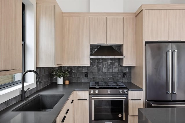 2709 Stacy Ln Unit 1, Austin, TX 78704 - kitchen with appliances with stainless steel finishes, light brown cabinets, a sink, and dark countertops