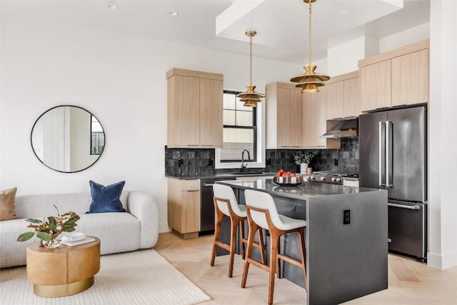 2709 Stacy Ln Unit 1, Austin, TX 78704 - kitchen featuring high quality fridge, light brown cabinetry, dishwasher, and dark countertops