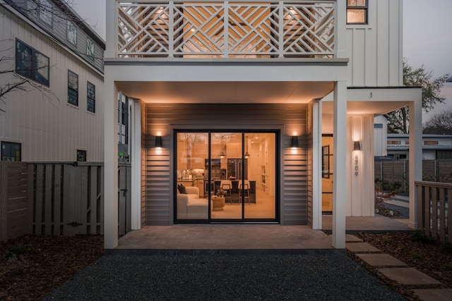 2709 Stacy Ln Unit 1, Austin, TX 78704 - entrance to property with a balcony, board and batten siding, and driveway