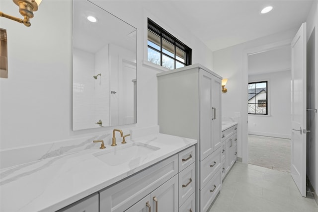 3008 W 50th St, Austin, TX 78731 - bathroom featuring vanity, recessed lighting, tile patterned floors, and a shower