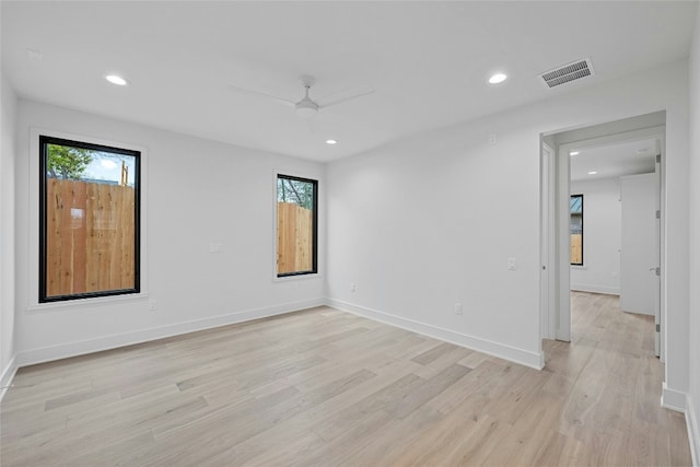 3008 W 50th St, Austin, TX 78731 - unfurnished room with ceiling fan, light wood finished floors, and recessed lighting