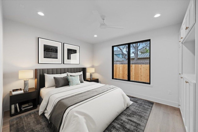 3008 W 50th St, Austin, TX 78731 - bedroom with light wood-style floors, recessed lighting, and a ceiling fan