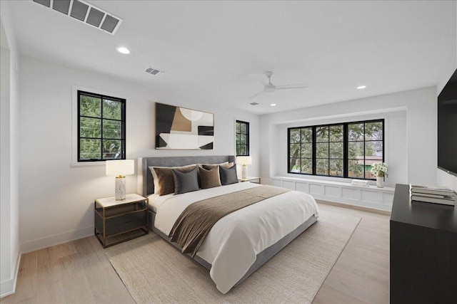 3008 W 50th St, Austin, TX 78731 - bedroom with light wood-style floors, recessed lighting, and a ceiling fan