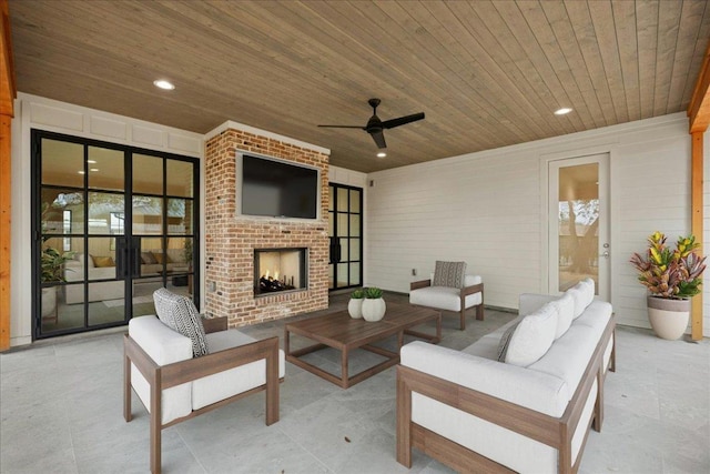 3008 W 50th St, Austin, TX 78731 - view of patio / terrace with an outdoor living space with a fireplace and a ceiling fan