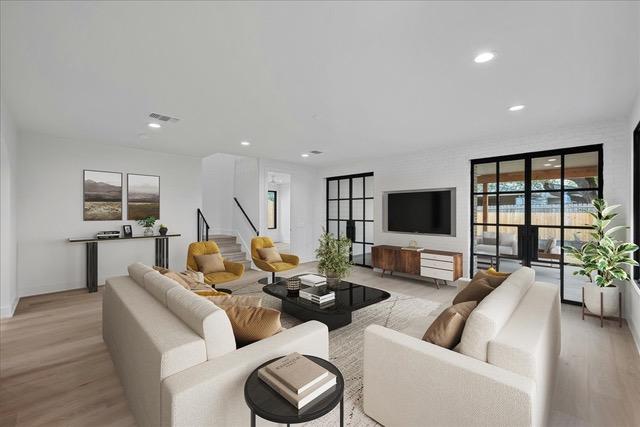 3008 W 50th St, Austin, TX 78731 - living room featuring light wood-style flooring and recessed lighting