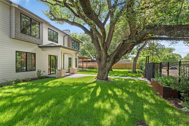 3008 W 50th St, Austin, TX 78731 - fenced backyard with a patio area