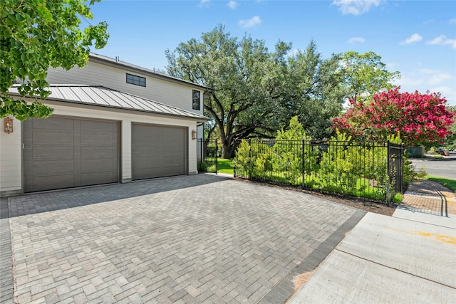 3008 W 50th St, Austin, TX 78731 - garage with decorative driveway