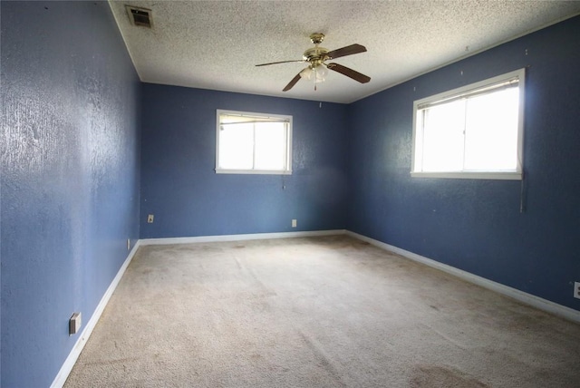 2810 Inwood Rd, Temple, TX 76502 - carpeted empty room with ceiling fan and a textured ceiling