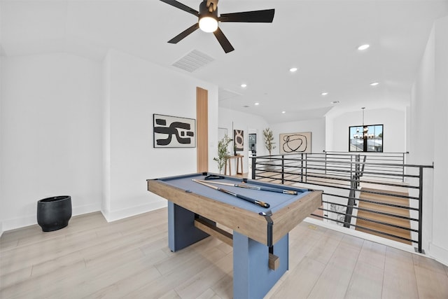 recreation room with ceiling fan with notable chandelier, pool table, lofted ceiling, and light hardwood / wood-style floors