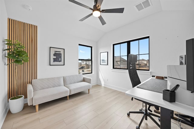 office area with ceiling fan, lofted ceiling, and light hardwood / wood-style flooring