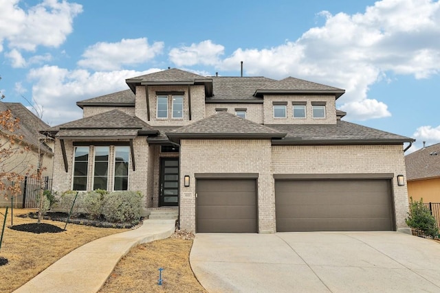 prairie-style home with a garage