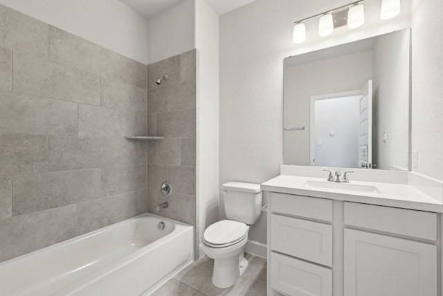 full bathroom with vanity, toilet, and tiled shower / bath