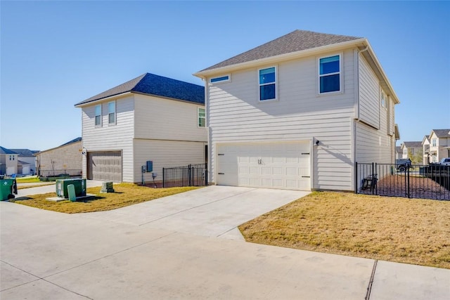 view of side of home featuring a garage