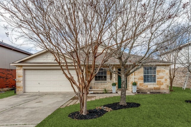 ranch-style house featuring a garage and a front yard