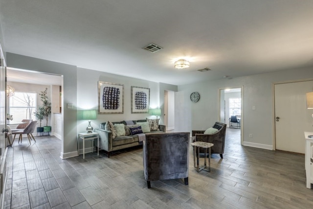 living room featuring dark hardwood / wood-style floors