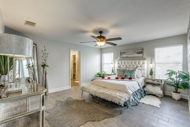 bedroom featuring light hardwood / wood-style floors and ceiling fan