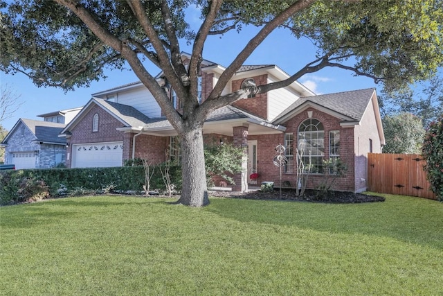 view of front facade with a garage and a front lawn