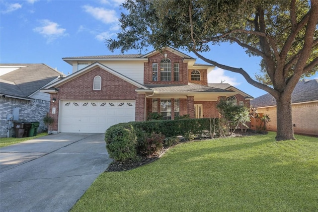 view of property with a garage and a front lawn