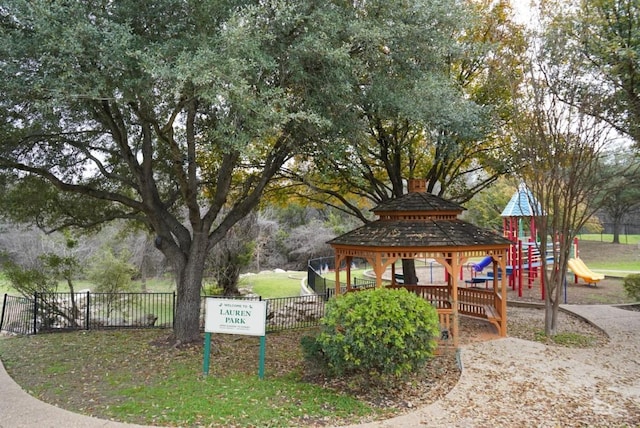 view of property's community with a playground