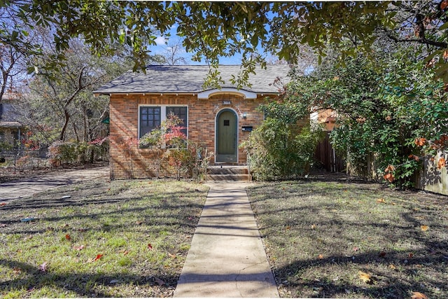 3014 Hemphill Park, Austin, TX 78705 - view of front of house featuring brick siding and a shingled roof
