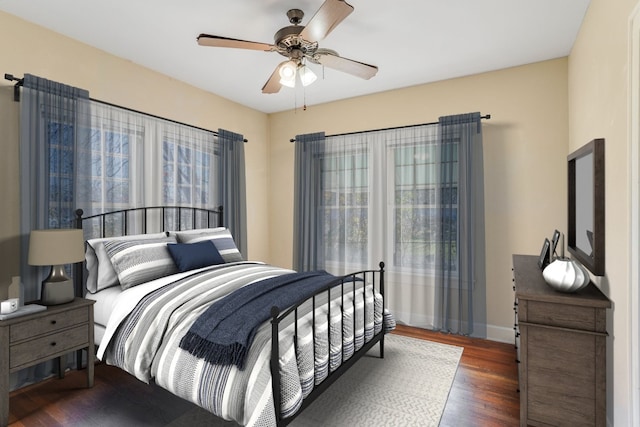 3014 Hemphill Park, Austin, TX 78705 - bedroom featuring wood finished floors and a ceiling fan