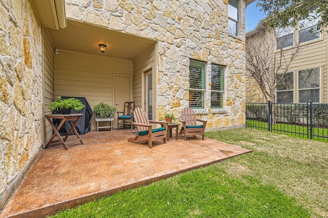 view of patio / terrace with fence