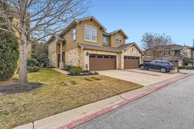 view of front of home with central AC unit, a garage, and a front lawn