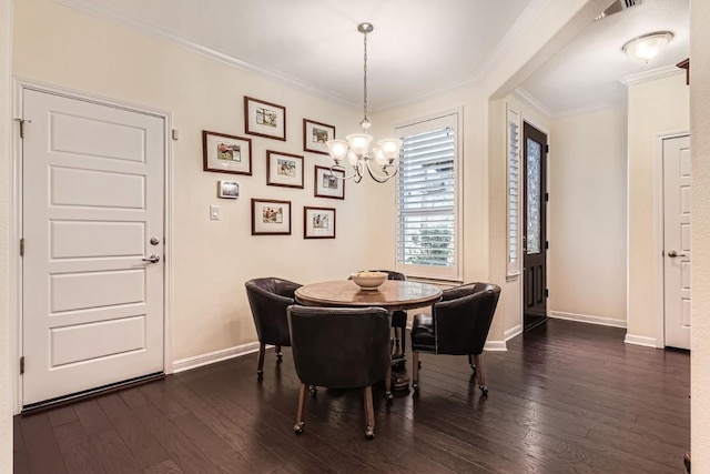 dining space featuring ornamental molding, dark hardwood / wood-style floors, and a notable chandelier