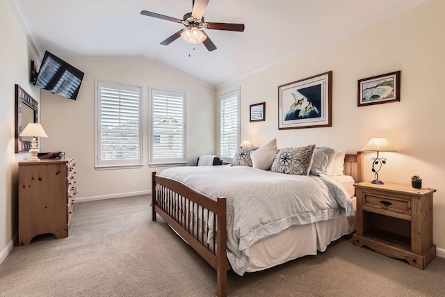 bedroom featuring light colored carpet, lofted ceiling, multiple windows, and baseboards