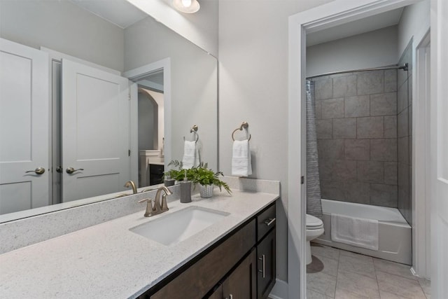 full bathroom featuring vanity, shower / tub combo with curtain, and toilet