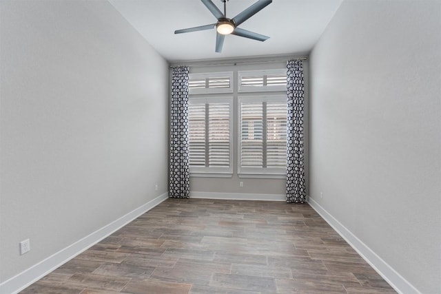 empty room featuring ceiling fan and light hardwood / wood-style floors