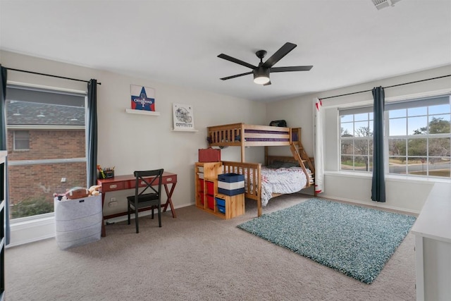 bedroom featuring carpet, baseboards, and ceiling fan