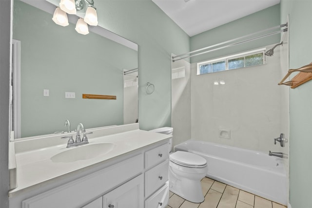 full bathroom featuring vanity, bathtub / shower combination, and toilet