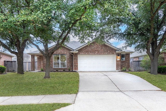 single story home featuring a front lawn and a garage