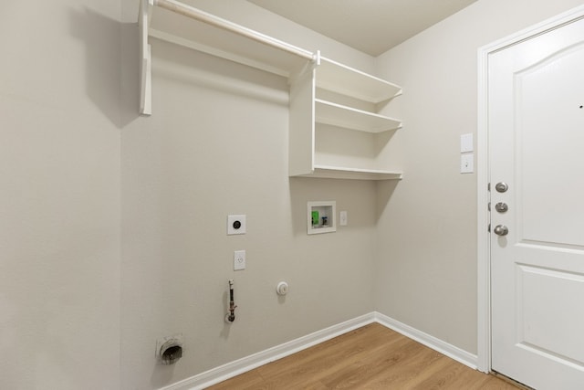 washroom with washer hookup, hookup for a gas dryer, wood-type flooring, and hookup for an electric dryer