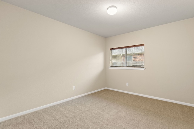 4323 Fairway Path, Round Rock, TX 78665 - spare room featuring carpet flooring and baseboards
