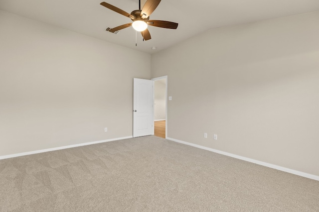 unfurnished room with ceiling fan, carpet, and lofted ceiling