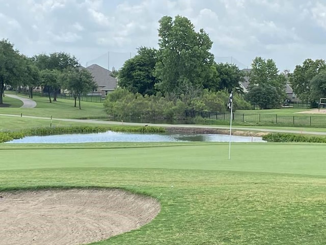 4323 Fairway Path, Round Rock, TX 78665 - view of property's community with a water view, an area to practice putting, and view of golf course