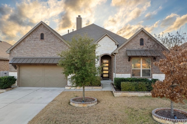 view of front of home with a yard