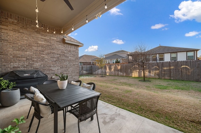 view of patio featuring ceiling fan and area for grilling